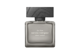 A front-facing view of the Narciso Rodriguez "For Him Musc Santal" fragrance bottle, featuring a minimalist frosted grey glass design with a rectangular silhouette and a dark, wood-textured block cap.