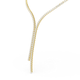 A close-up view of the Swarovski Matrix Y necklace closure, showcasing the polished 18K gold-plated lobster clasp, the adjustable extender chain, and the delicate signature octagonal emblem with a hanging crystal drop.