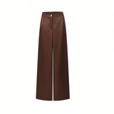 Front view of Nenette high-waisted, wide-leg trousers in a smooth chocolate brown satin fabric, featuring a clean waistline with a single front button closure.