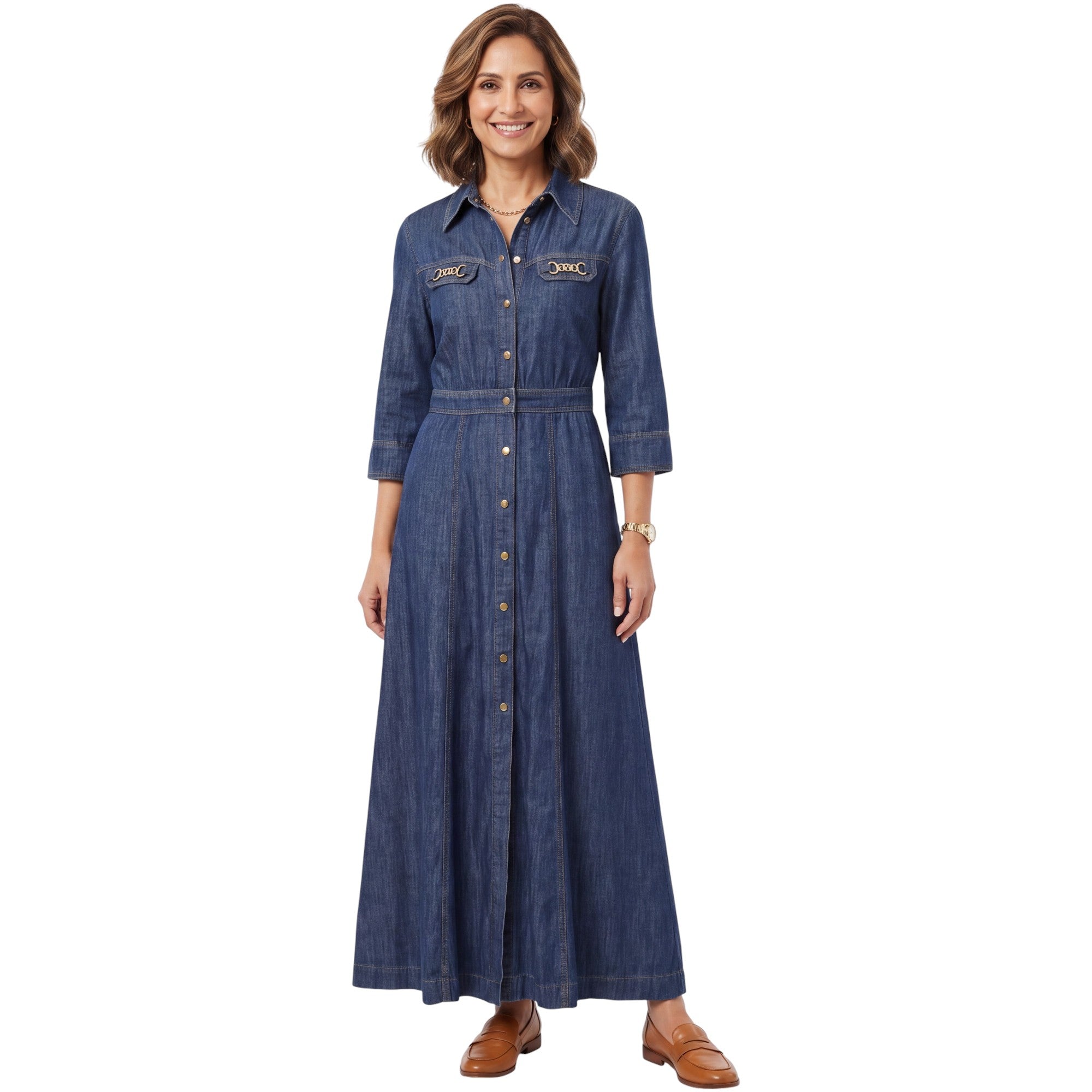 Full-length model image featuring a woman with shoulder-length brown hair smiling while wearing the Nenette denim maxi shirt dress paired with brown leather loafers.