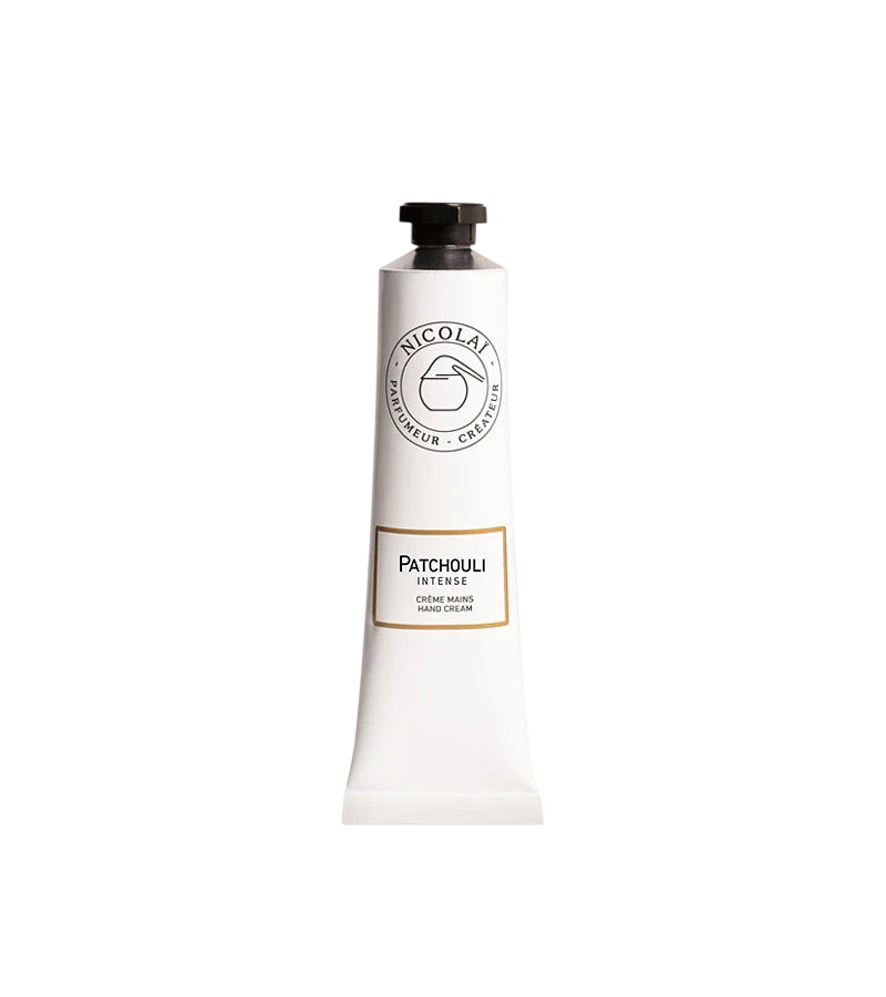 A white squeeze tube of Nicolaï Patchouli Intense Hand Cream featuring a black octagonal cap and the brand's classic circular logo.