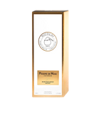 The elegant white and gold-bordered presentation box for the Nicolaï Poudre de Musc Intense Hair Mist, showing the 50ml size marking.