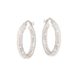 Pair of silver-toned hoop earrings with a hammered, textured surface.