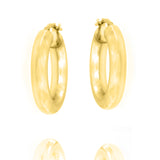 Pair of thick, polished, gold-toned hoop earrings with visible clasps.