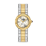 Saint Honore women's watch with a round gold-toned case, white floral patterned dial, and two-tone gold and silver link brace