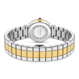 Back of a watch with a silver-toned case, gold-toned bezel, and crown with a dark blue stone. Two-toned silver and gold-toned
