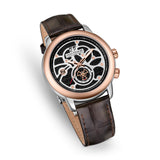 Silver-toned watch with rose-gold-toned bezel, skeletonized black and silver-toned dial, and dark brown crocodile-embossed le