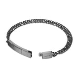 A studio view of the Guido chain bracelet unclasped, revealing the interlocking puzzle-style closure mechanism and the laser-engraved Cerruti 1881 signature logo.