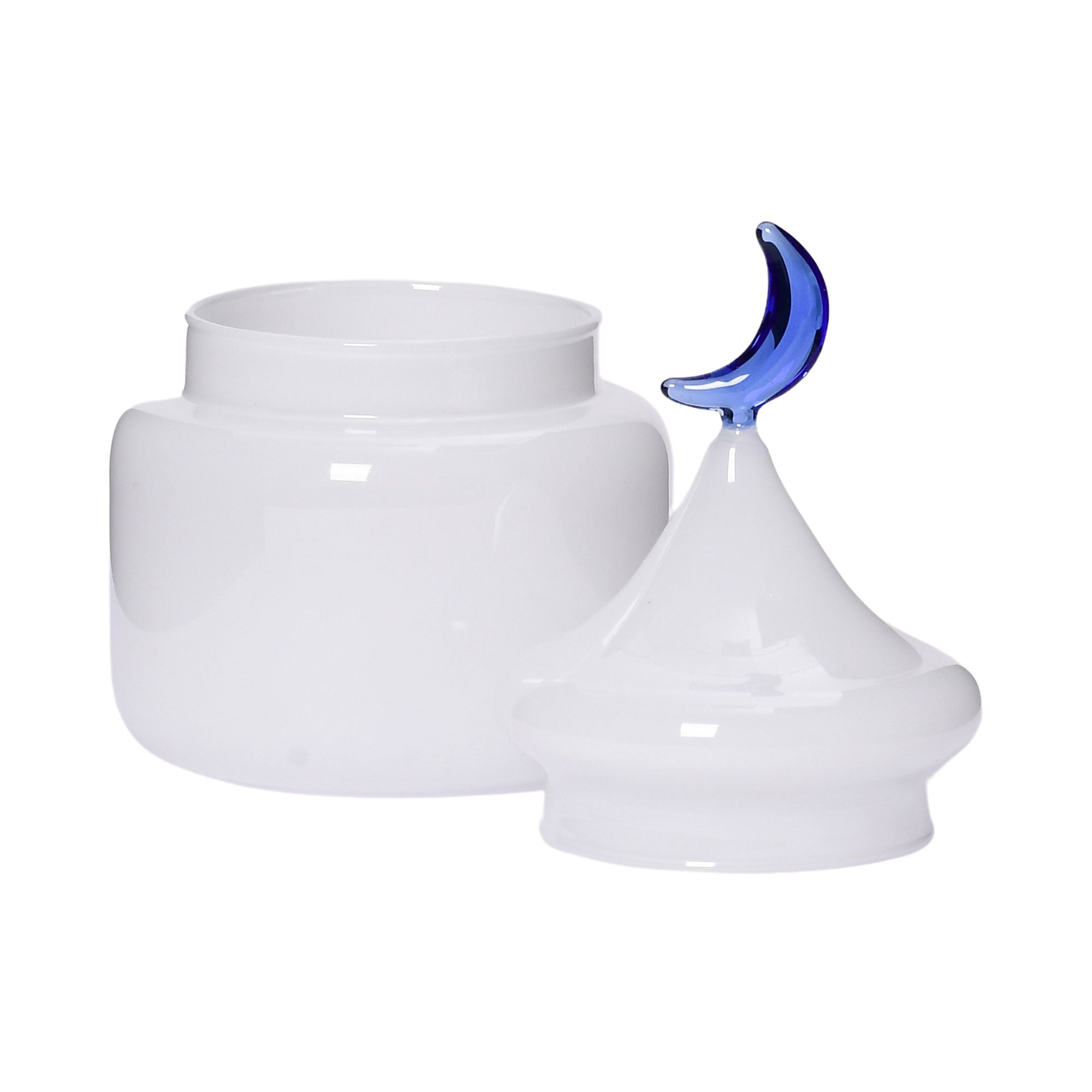 Open lid view of the Favorite Glass white decorative storage jar with dome lid and blue moon handle. Shop the Collection Online