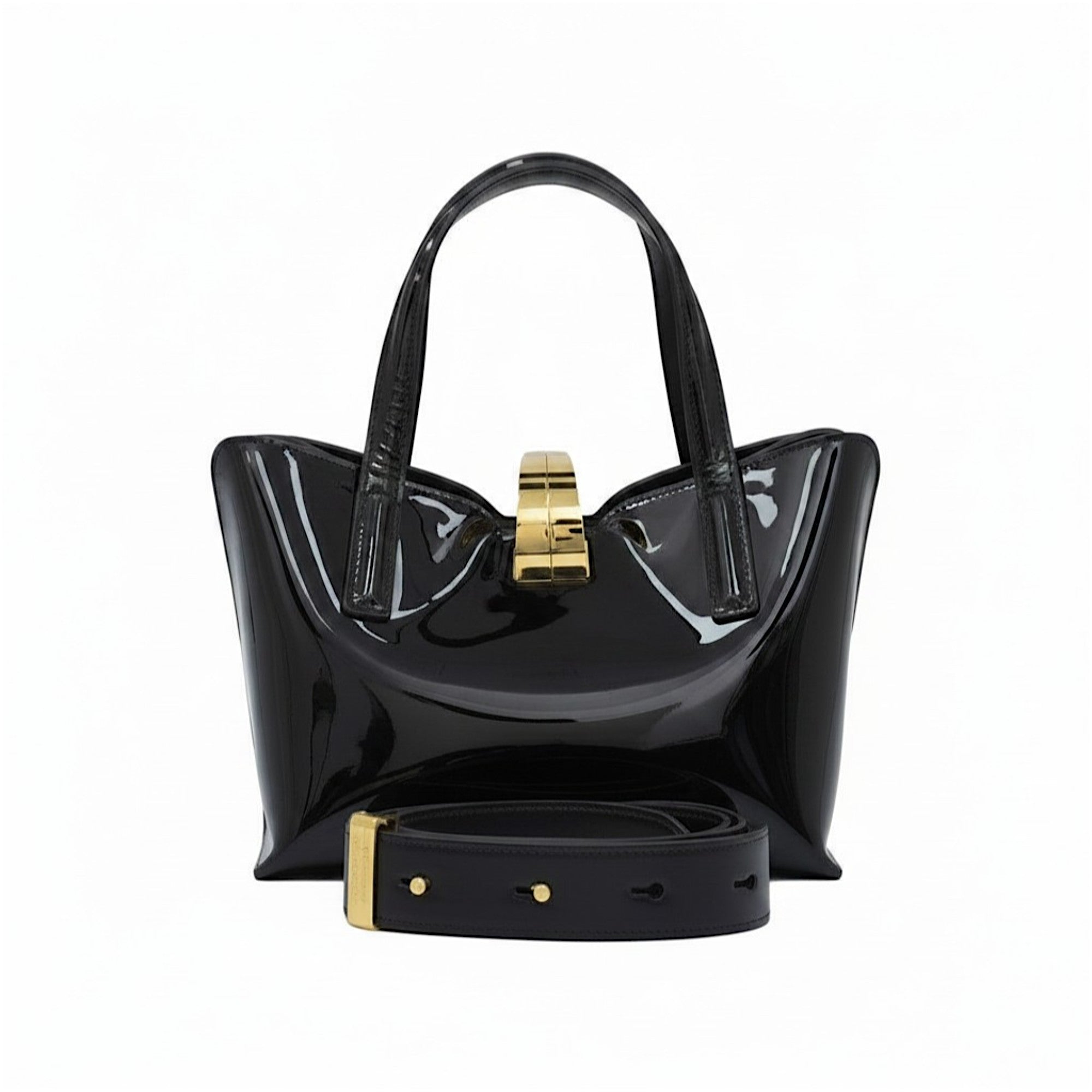 Black patent leather handbag with gold accents on a white background.