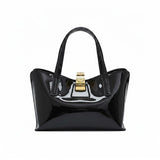 Black handbag with a gold clasp on a white background.