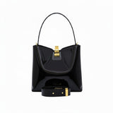Front view of a Black patent leather shoulder bag with a gold-tone clasp closure, available at Blue Salon.
