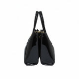 Black handbag with gold accents on a white background.