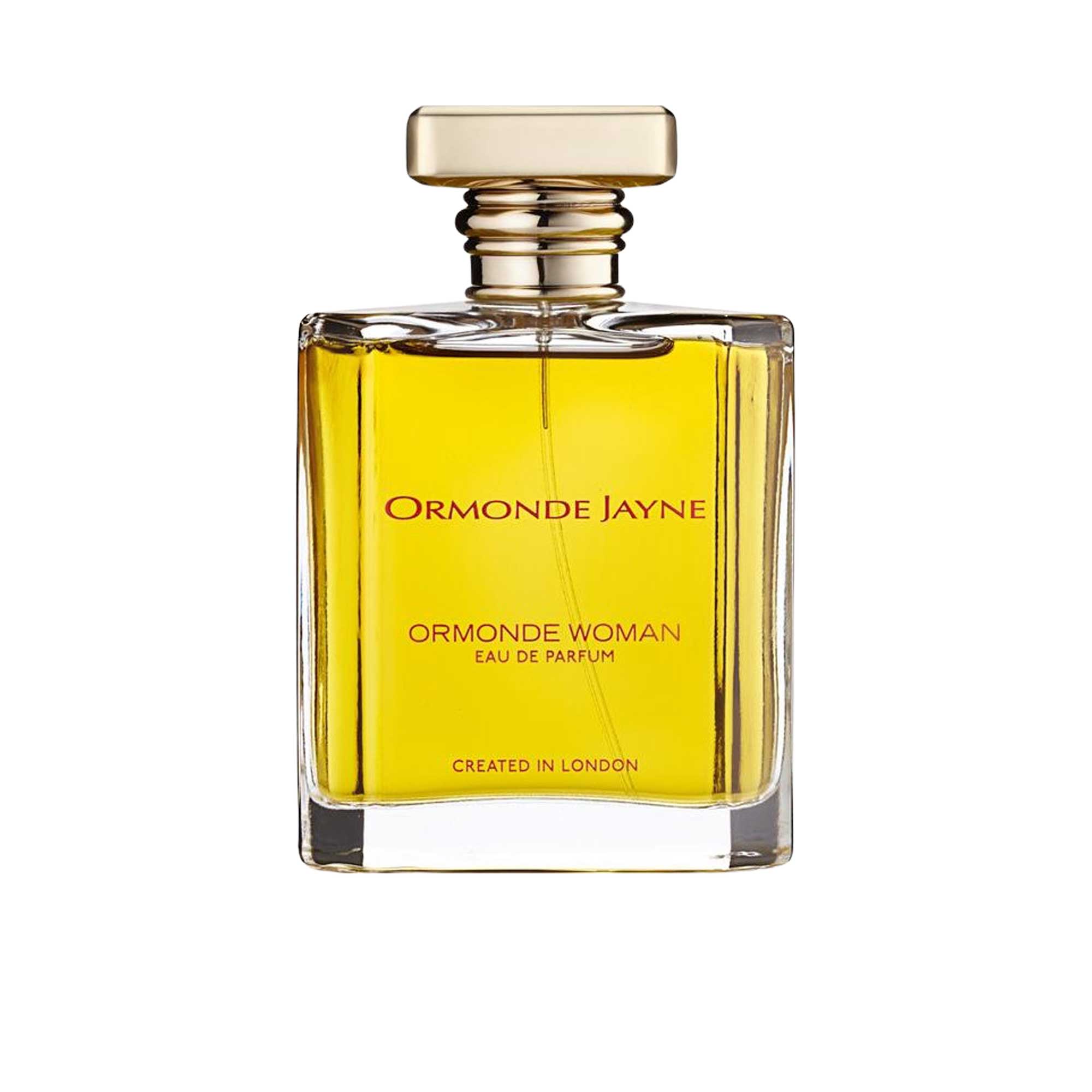 A clear glass bottle of Ormonde Jayne Ormonde Woman Eau De Parfum with a gold-colored cap and label.