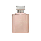 An 88ml opaque blush-pink glass bottle of Ormonde Jayne Montabaco Flor, featuring gold lettering and topped with a tiered silver neck and rectangular silver cap.