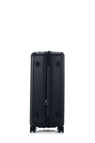 Other side view of the Samsonite Voypod Spinner medium in Black, showcasing its sleek, boxy hardshell design and the prominent front-access pocket panel. Find Online Today