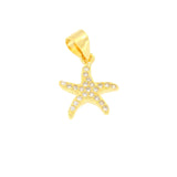 Gold-toned starfish charm covered in clear rhinestones, with a smooth bail at the top.