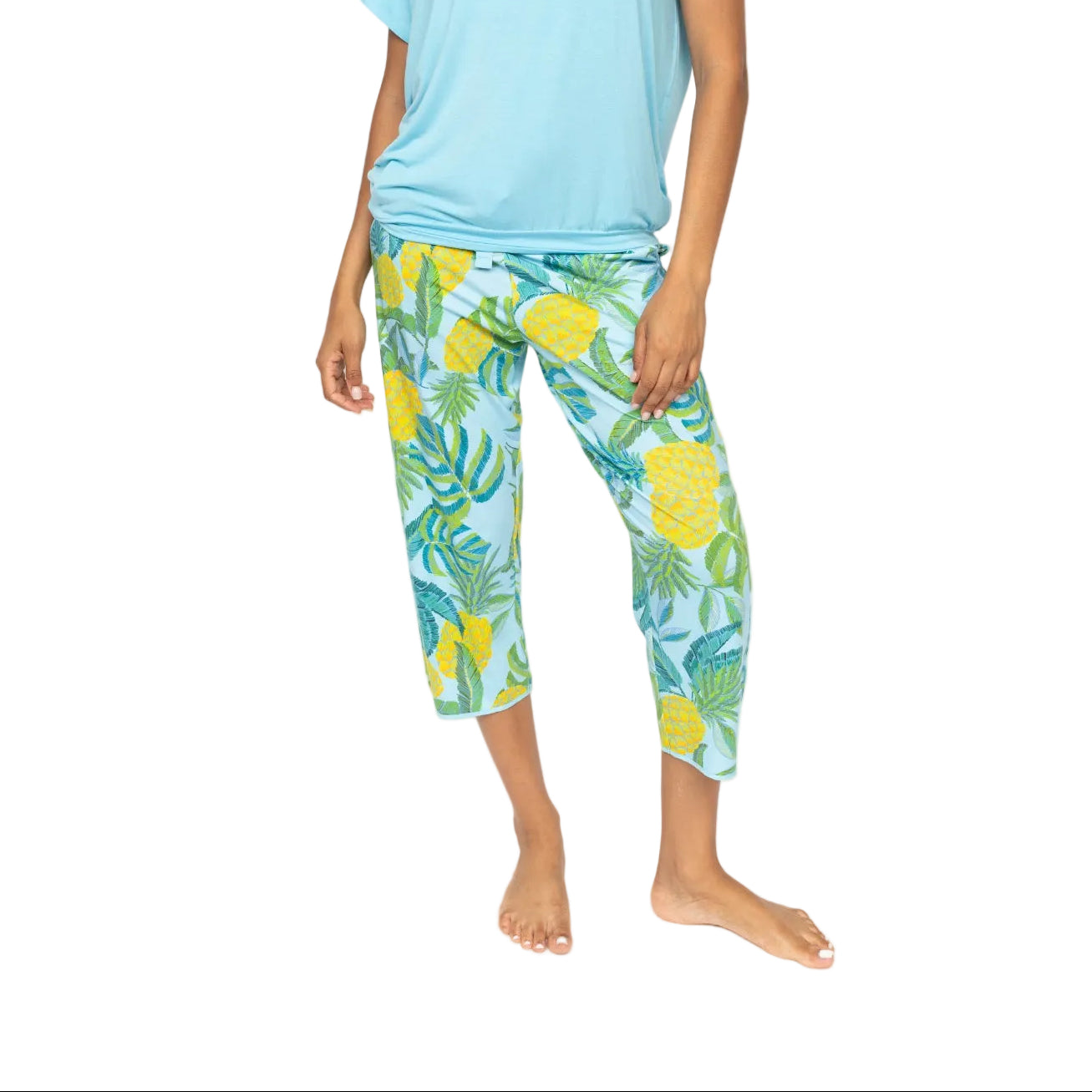 Light blue jersey cropped pyjama bottoms with a yellow and green pineapple and leaf print, featuring an elasticated drawstrin