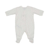 Petit Bateau baby footed onesie in off-white with a small, all-over grey heart print and front snap closures.