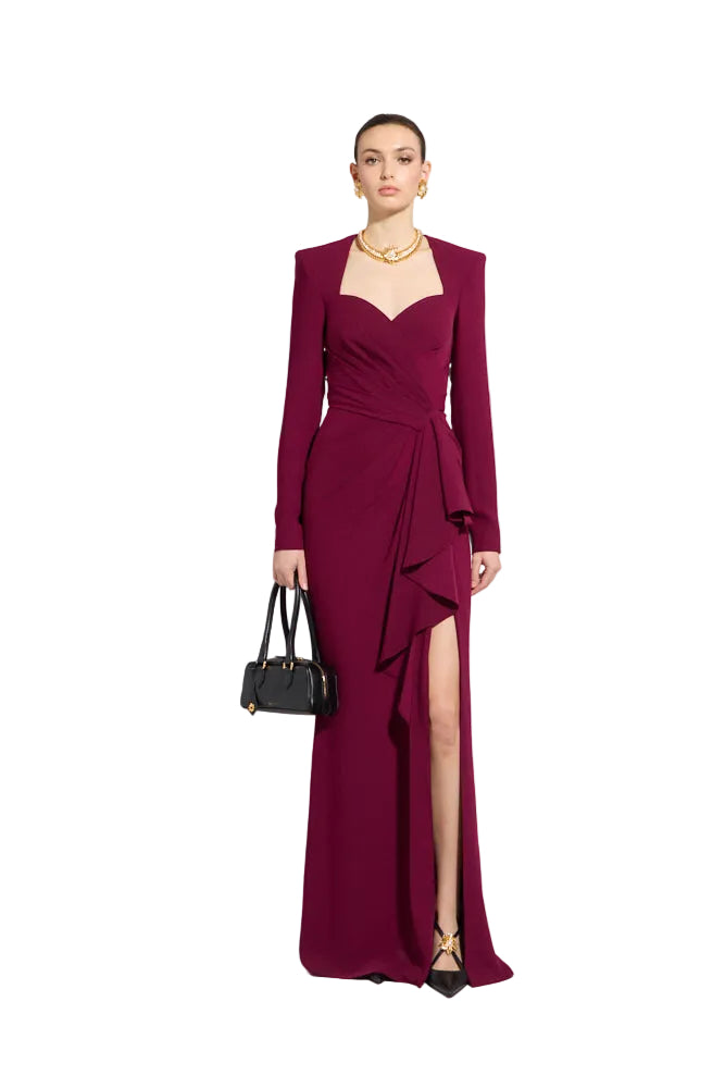 Purple potion long sleeve floor-length gown with sweetheart neckline, structured shoulders, draped bodice, and high side slit