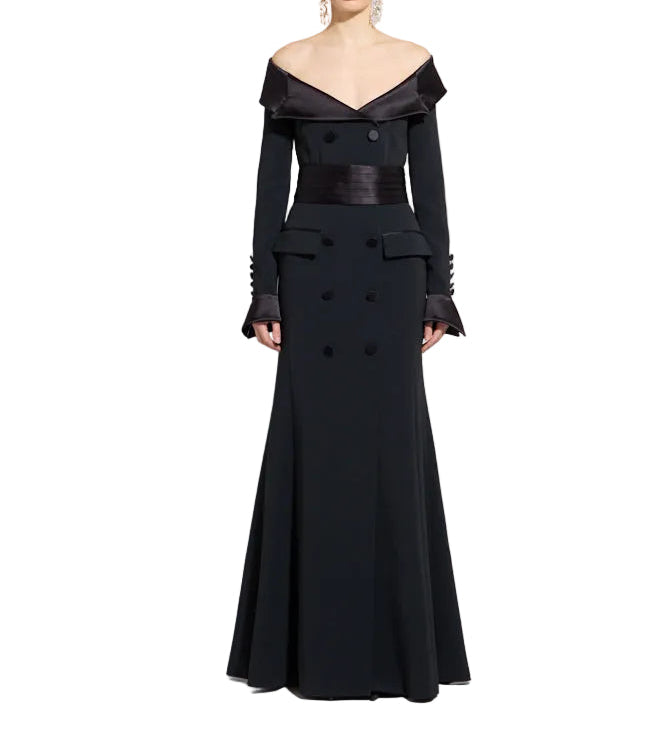 Black off-the-shoulder floor-length gown with long sleeves, a satin neckline, wide satin waistband, and double-breasted butto