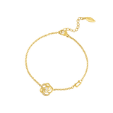 Gold-toned chain bracelet with a central openwork floral charm featuring clear crystals, a lobster clasp, and an extender cha