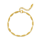 Gold-toned Police Custom Links bracelet with elongated oval segments, each featuring ribbed interior detailing, a lobster cla