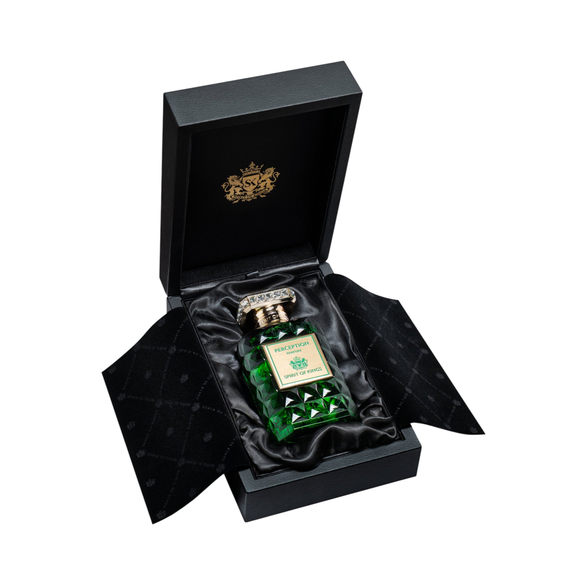Green faceted glass perfume bottle with a gold-toned, jeweled cap and a light green label displaying 'Perception' and 'Spirit
