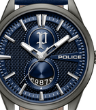 Dark grey-cased watch with a blue textured dial, silver-toned markers and hands, a blue sub-dial with date, and a blue leathe