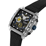 Rectangular watch with a clear case, black and blue dial with yellow accents, white hands, black textured strap, blue crown,