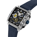 Rectangular watch with clear case, black dial with blue and yellow accents, white hands, and a dark blue textured strap. Blue