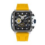 Clear square watch with black and blue dial, yellow accents, and a wide yellow silicone strap. Dark blue crown.