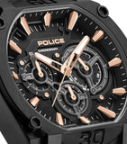 Black chronograph watch with a textured black dial, rose gold-toned faceted markers, luminous hands, three sub-dials, and hex
