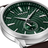 Silver-toned watch with a textured green dial, geometric pattern, silver-toned hands/markers, a green sub-dial, and brown lea