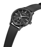 Black-toned watch with a textured black dial, silver-toned hands and markers, a sub-dial, and a black leather strap with stit