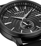 Black watch with a black textured geometric dial, silver-toned hands and bar markers, a 24-hour sub-dial, and a black leather
