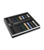 Police watch set with a clear TR90 case, blue skeleton dial, and multiple interchangeable silicone straps in black, brown, bl