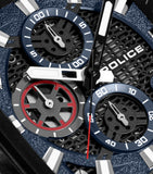 Blue watch dial with three sub-dials, black mesh texture, white hour markers, silver-toned hands, and a red second hand.