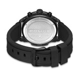 Black watch with a black silicone strap and black buckle. The silver-toned caseback features a sunburst pattern and "POLICE"