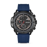 Gunmetal black chronograph watch with a black dial, white markers, red accents, and a blue silicon strap.