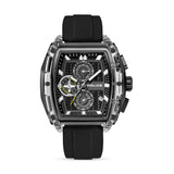 Rectangular watch with clear TR90 case, black textured dial, three subdials, date window, and black silicone strap.