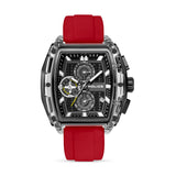 Rectangular watch with a clear case, black textured dial, white markers, three sub-dials, and a red silicone strap.
