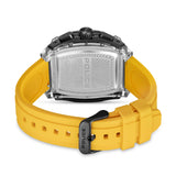 Rectangular black watch with a silver-toned back, black buttons, and a bright yellow silicone strap with a black buckle.