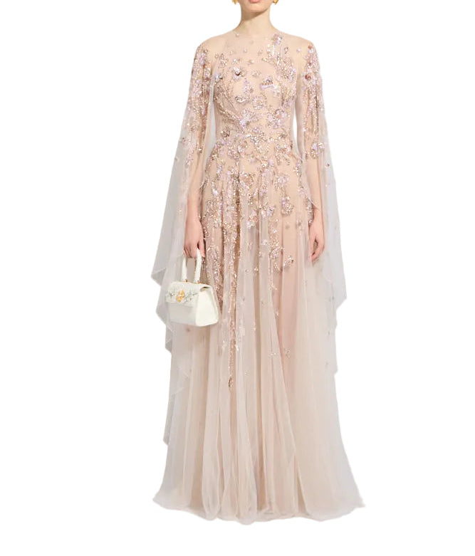 Pale pink sheer kaftan gown with intricate gold-toned, pink, and purple floral beadwork and flowing cape sleeves.