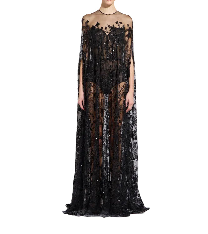 Black sheer kaftan with intricate floral embroidery and scattered sequins, featuring a round neckline and long, open cape sle