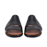 Pair of PRESTIGE sandals facing forward, highlighting the architectural triple-strap leather design.