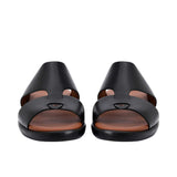 Pair of black Prestige leather sandals facing forward, highlighting the open-toe design and dual-strap construction.