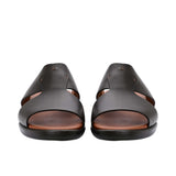 Pair of brown Prestige leather sandals facing forward, highlighting the open-toe design and wide leather straps.