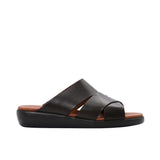 Side profile of a PRESTIGE brown leather slide sandal featuring a thick black ergonomic wedge sole and tan footbed.