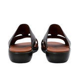 Back view of the sandals showing the heel cushioning and the "Prestige" branding embossed on the black outsole.